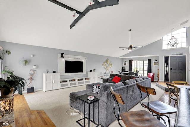 826 Royal Saint George Dr, Greenwood, IN 46143 - living room with high vaulted ceiling, a ceiling fan, and light wood finished floors