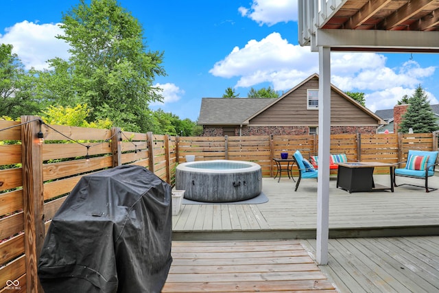 826 Royal Saint George Dr, Greenwood, IN 46143 - deck featuring grilling area, a fire pit, and a hot tub