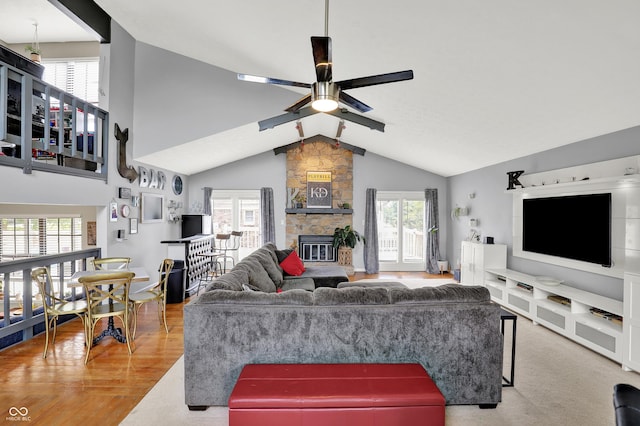 826 Royal Saint George Dr, Greenwood, IN 46143 - living area featuring ceiling fan, vaulted ceiling, a fireplace, and wood finished floors