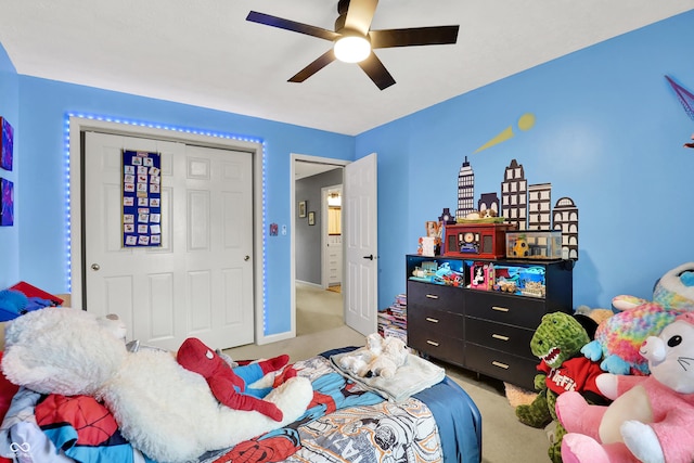 826 Royal Saint George Dr, Greenwood, IN 46143 - bedroom with light carpet, a closet, and a ceiling fan