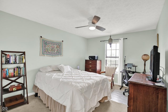 826 Royal Saint George Dr, Greenwood, IN 46143 - bedroom featuring light carpet, a desk, and a ceiling fan