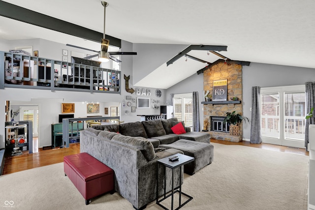 826 Royal Saint George Dr, Greenwood, IN 46143 - living room with wood finished floors, ceiling fan, and a fireplace