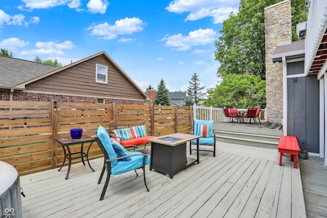 826 Royal Saint George Dr, Greenwood, IN 46143 - deck with an outdoor fire pit and outdoor dining area