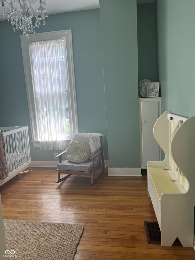 2131 Union St, Lafayette, IN 47904 - sitting room with a chandelier and wood finished floors