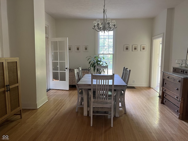 2131 Union St, Lafayette, IN 47904 - dining room with a chandelier and wood finished floors