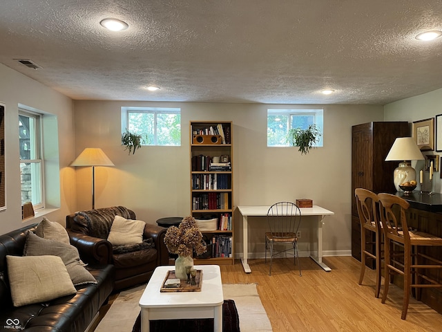 2131 Union St, Lafayette, IN 47904 - living room with a textured ceiling, light wood-style floors, healthy amount of natural light, and recessed lighting