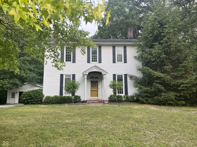 2131 Union St, Lafayette, IN 47904 - colonial inspired home with a front lawn and a chimney