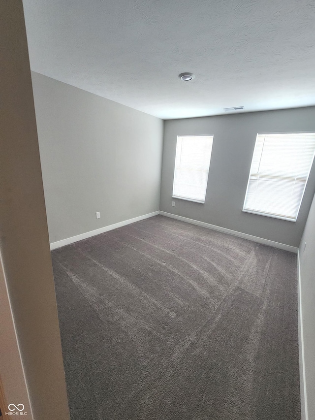 2431 S Carlota Dr, New Palestine, IN 46163 - carpeted spare room with baseboards
