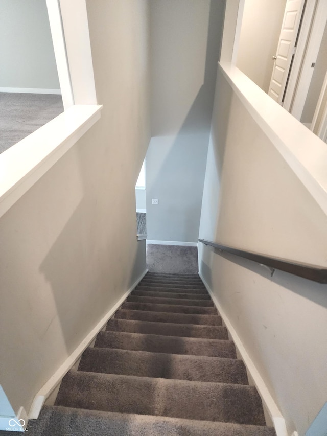2431 S Carlota Dr, New Palestine, IN 46163 - stairs with carpet floors and baseboards