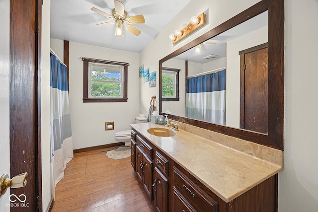 10227 E 500 S, Otterbein, IN 47970 - full bath with vanity, wood finished floors, a ceiling fan, and a shower with curtain