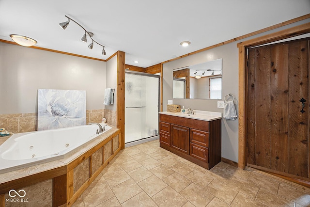 10227 E 500 S, Otterbein, IN 47970 - bathroom featuring a stall shower, vanity, a jetted tub, ornamental molding, and rail lighting