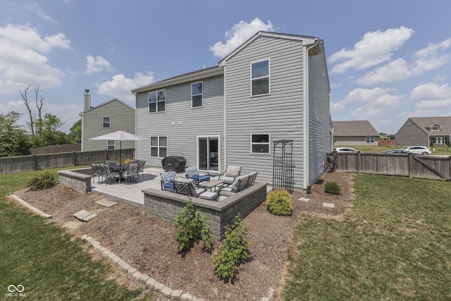 12291 Falling Leaves Trl, Indianapolis, IN 46229 - rear view of house with an outdoor living space, a patio, and a fenced backyard