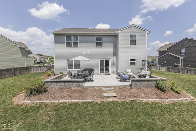 12291 Falling Leaves Trl, Indianapolis, IN 46229 - back of property featuring a patio area, a fenced backyard, and an outdoor hangout area