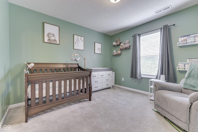 12291 Falling Leaves Trl, Indianapolis, IN 46229 - carpeted bedroom featuring baseboards and a crib