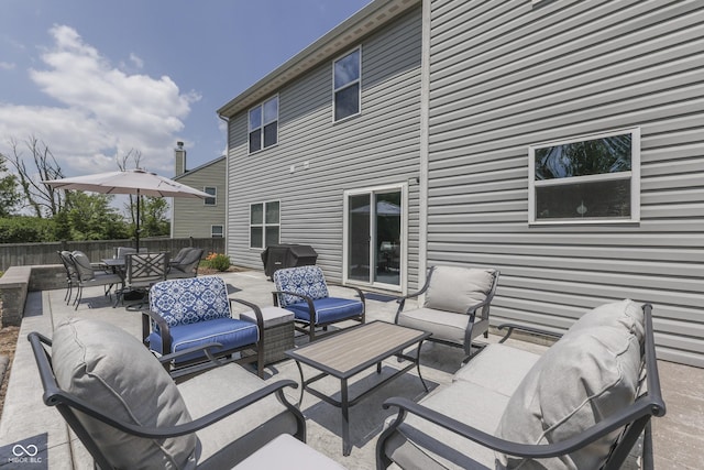 12291 Falling Leaves Trl, Indianapolis, IN 46229 - view of patio with an outdoor living space, a grill, and outdoor dining space