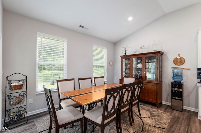 2584 Lanai Ln, Greenwood, IN 46143 - dining space featuring vaulted ceiling, dark wood finished floors, and recessed lighting