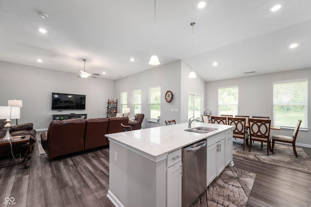 2584 Lanai Ln, Greenwood, IN 46143 - kitchen with stainless steel dishwasher, dark wood finished floors, recessed lighting, white cabinetry, and decorative light fixtures