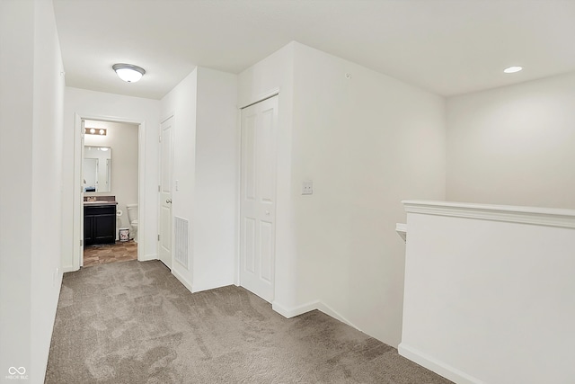 12075 Scoria Dr Unit 500, Fishers, IN 46038 - hallway featuring carpet and baseboards