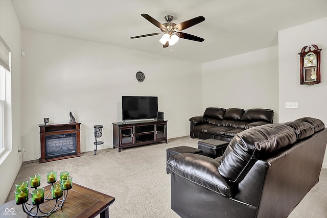 12075 Scoria Dr Unit 500, Fishers, IN 46038 - living area featuring light carpet, a ceiling fan, and a fireplace