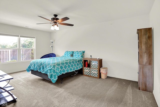 12075 Scoria Dr Unit 500, Fishers, IN 46038 - bedroom featuring carpet and a ceiling fan