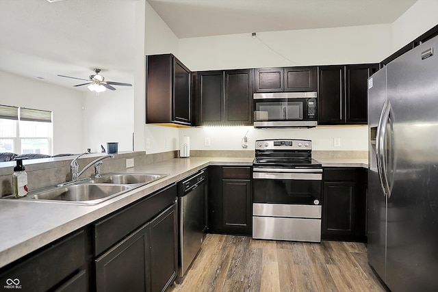 12075 Scoria Dr Unit 500, Fishers, IN 46038 - kitchen featuring stainless steel appliances, light wood finished floors, a ceiling fan, and light countertops