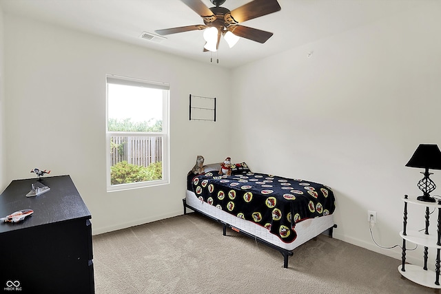 12075 Scoria Dr Unit 500, Fishers, IN 46038 - carpeted bedroom with baseboards and ceiling fan