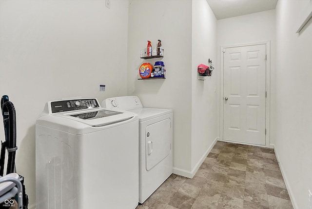 12075 Scoria Dr Unit 500, Fishers, IN 46038 - laundry area with separate washer and dryer and stone finish floors