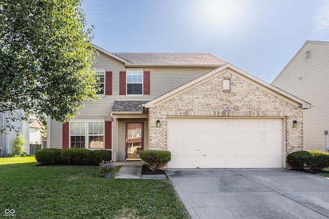 3923 N Bressingham Dr, Indianapolis, IN 46235 - traditional-style house featuring driveway, a front yard, a garage, brick siding, and roof with shingles