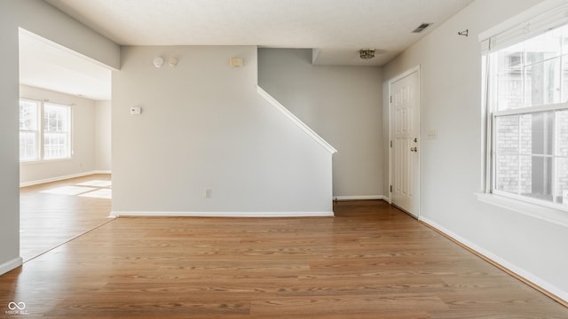 3923 N Bressingham Dr, Indianapolis, IN 46235 - foyer entrance featuring wood finished floors and stairs