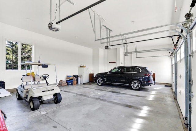 523 S 700 E, Whitestown, IN 46075 - garage featuring a garage door opener