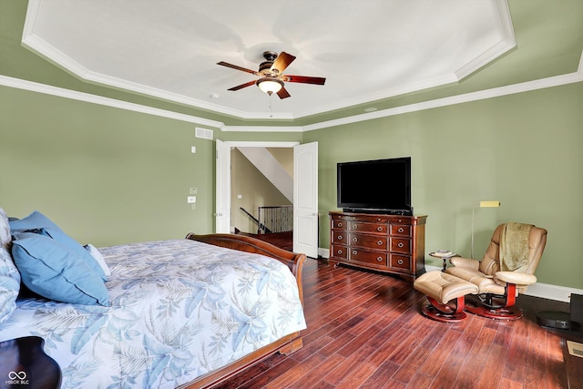523 S 700 E, Whitestown, IN 46075 - bedroom with wood finished floors, a ceiling fan, crown molding, and a raised ceiling