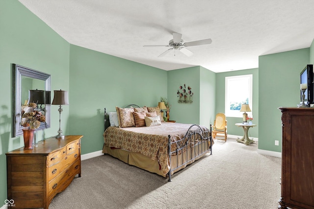 523 S 700 E, Whitestown, IN 46075 - carpeted bedroom with baseboards and ceiling fan