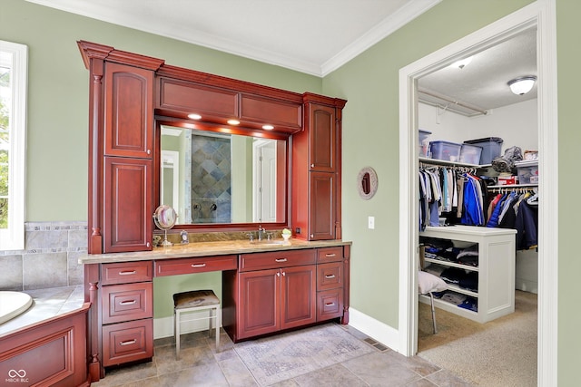 523 S 700 E, Whitestown, IN 46075 - full bath featuring vanity, ornamental molding, tiled shower, a walk in closet, and a bath