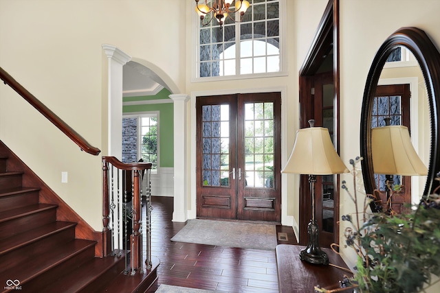 523 S 700 E, Whitestown, IN 46075 - entryway featuring arched walkways, french doors, hardwood / wood-style flooring, decorative columns, and stairs