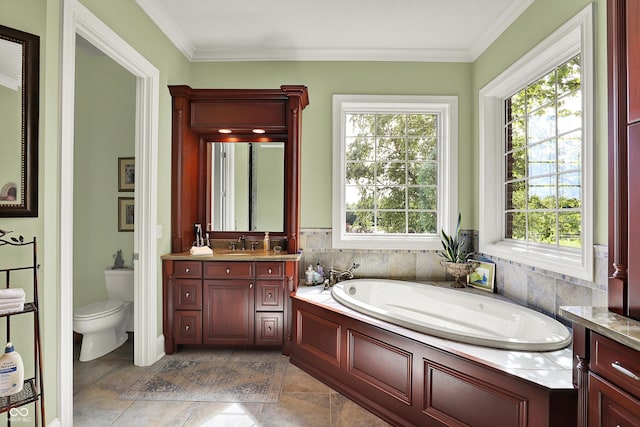 523 S 700 E, Whitestown, IN 46075 - bathroom with vanity, plenty of natural light, a garden tub, and crown molding