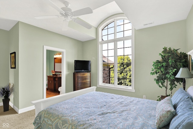 523 S 700 E, Whitestown, IN 46075 - carpeted bedroom featuring lofted ceiling, ceiling fan, and connected bathroom