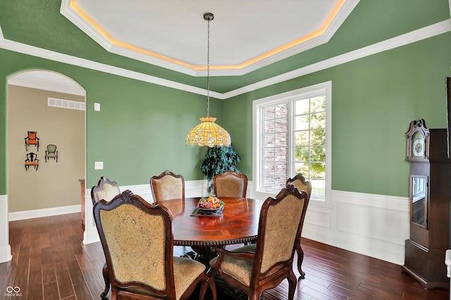 523 S 700 E, Whitestown, IN 46075 - dining room with a raised ceiling, crown molding, dark wood-style floors, and a wainscoted wall