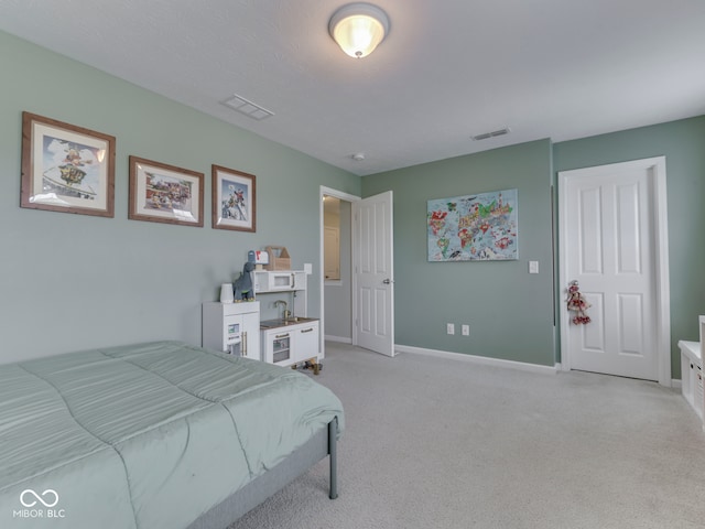 8330 Whitaker Valley Blvd, Indianapolis, IN 46237 - bedroom with baseboards and light colored carpet