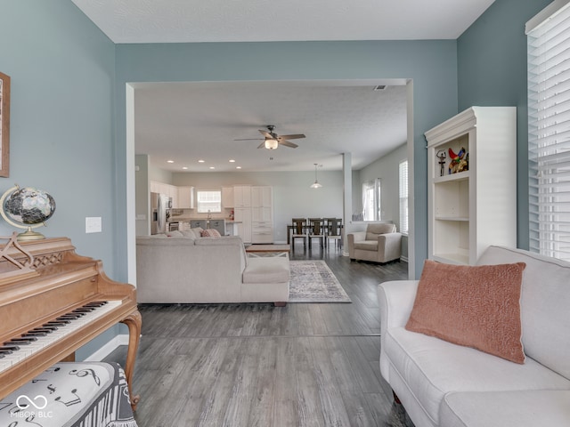 8330 Whitaker Valley Blvd, Indianapolis, IN 46237 - living area featuring a ceiling fan, wood finished floors, and recessed lighting