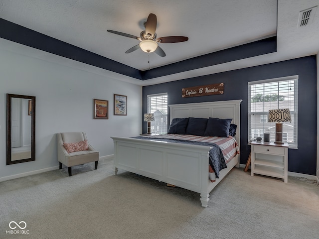 8330 Whitaker Valley Blvd, Indianapolis, IN 46237 - bedroom with a raised ceiling, multiple windows, and light carpet