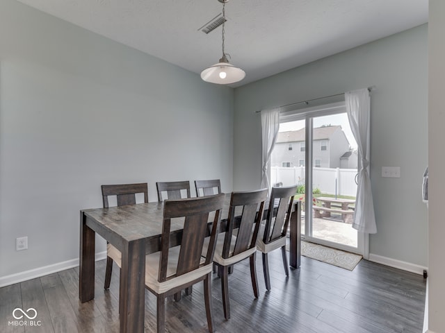 8330 Whitaker Valley Blvd, Indianapolis, IN 46237 - dining room with dark wood finished floors and baseboards