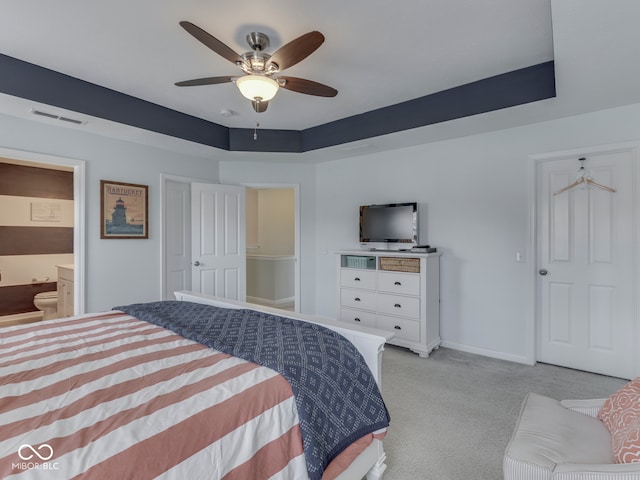 8330 Whitaker Valley Blvd, Indianapolis, IN 46237 - bedroom featuring light colored carpet, ensuite bath, and a ceiling fan