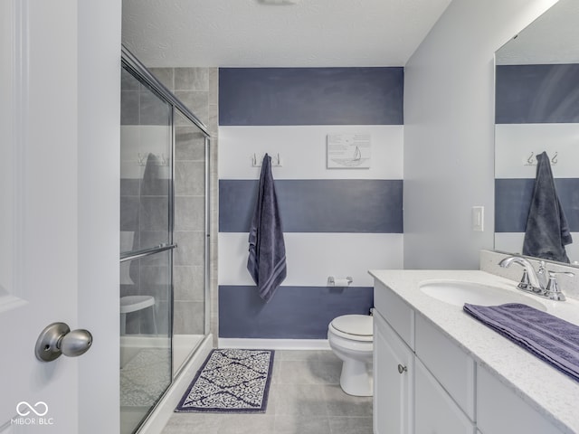 8330 Whitaker Valley Blvd, Indianapolis, IN 46237 - bathroom with a stall shower, vanity, tile patterned floors, and a textured ceiling