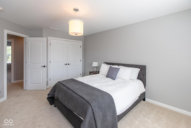 10334 Strongbow Rd, Fishers, IN 46040 - carpeted bedroom with baseboards and a closet