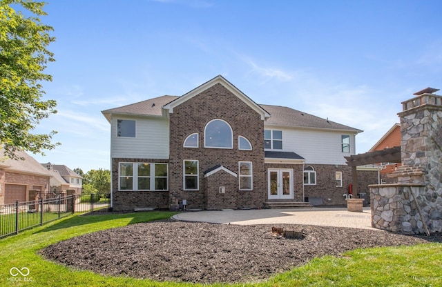 10334 Strongbow Rd, Fishers, IN 46040 - back of property featuring a patio, french doors, brick siding, and a pergola