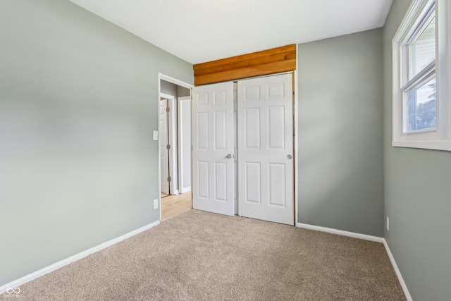 4113 Red Bird Dr, Indianapolis, IN 46222 - unfurnished bedroom with light carpet and a closet