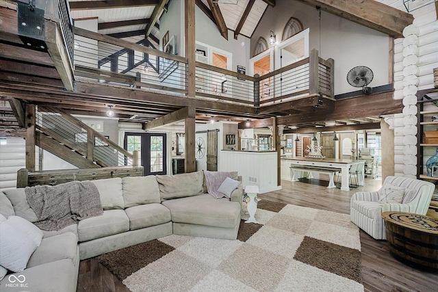 10823 E 200 N, Sheridan, IN 46069 - living room featuring high vaulted ceiling, beam ceiling, stairway, and wood finished floors
