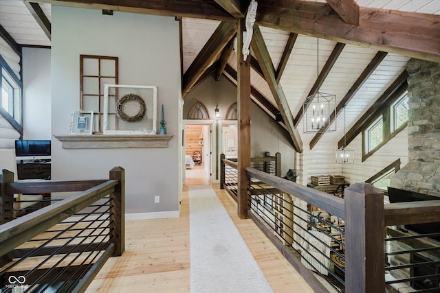 10823 E 200 N, Sheridan, IN 46069 - hallway with an upstairs landing, hardwood / wood-style flooring, a wood ceiling with exposed beams, high vaulted ceiling, and a chandelier