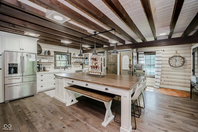 10823 E 200 N, Sheridan, IN 46069 - dining room with wood-type flooring and beam ceiling