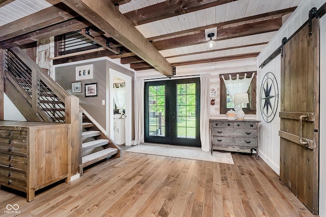 10823 E 200 N, Sheridan, IN 46069 - foyer with a barn door, hardwood / wood-style flooring, a wooden ceiling with exposed beams, stairway, and french doors